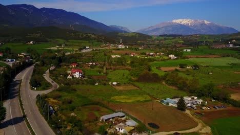 Scenic-Aerial-Views-Over-Greece-Landscape-with-Mount-Parnassus-in-the-Background-near-Livadias