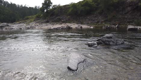 Indigenous-Stone-Grey-River-Rocks-Landscape-at-Coastal-Sand-Hills-South-America-Córdoba-Province-in-Calamuchita-Valley-Argentina