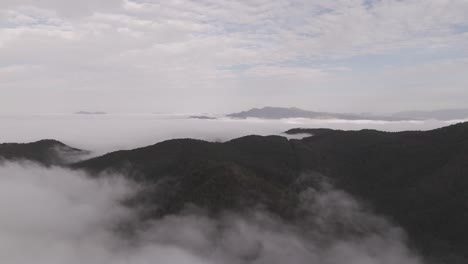 Beautiful-landscape,-aerial-view-of-mist-and-mountains