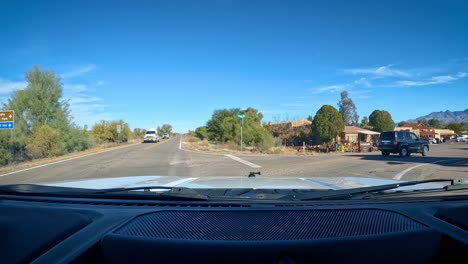 POV---Driving-into-the-village-past-the-large-sign-into-the-business-district-of-Tubac-with-many-boutiques-and-art-galleries
