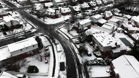 An-aerial-view-of-a-suburban-neighborhood-after-it-snowed