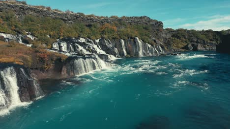 Incredibly-gorgeous-drone-aerial-of-green-pools-and-waterfalls-against-a-river-landscape-in-Gullfoss-Iceland