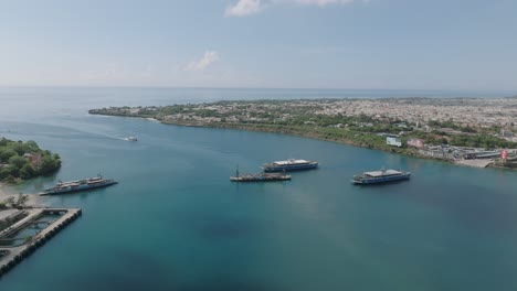 A-drone-shot-of-the-Likoni-Channel-in-Mombasa-with-ferries-and-clear-blue-waters