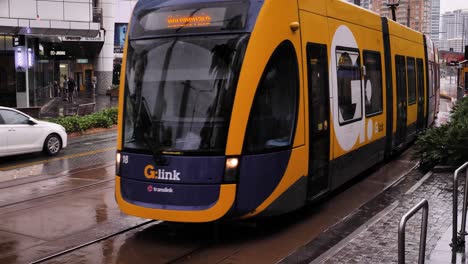 View-of-a-tram-and-cars-moving-along-Surfers-Paradise-Blvd-as-heavy-rain-and-storms-continue-to-lash-the-Gold-Coast-in-ongoing-storms-and-flooding