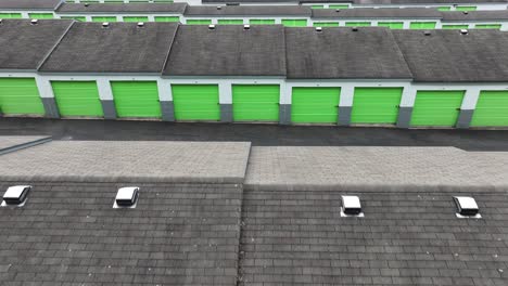 Aerial-flyover-roofs-of-rental-garage-units-in-american-suburb-district