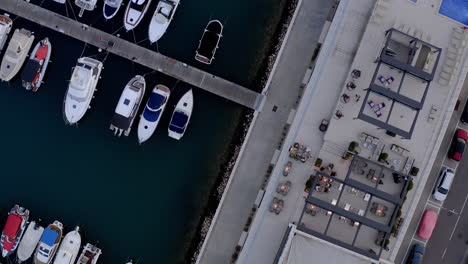 Top-down-aerial-view-of-a-harbour-with-boats-in-Croatia
