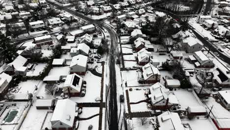 Una-Vista-Aérea-De-Un-Barrio-Suburbano-Después-De-Que-Nevó