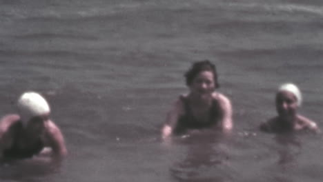 Three-Women-Have-Fun-in-the-Waves-of-the-Sea-in-1930s-Color-Footage