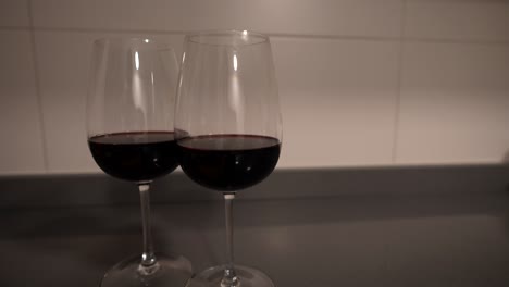 Two-red-wine-glasses-prepared-for-a-date-night,-4K