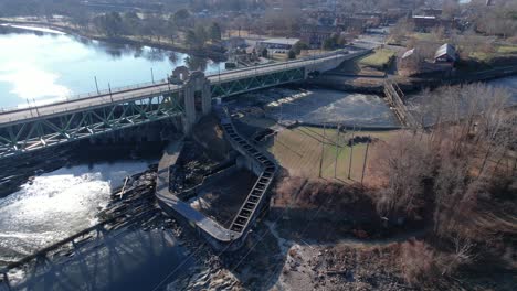 Circling-descend-around-turners-falls-bridge-and-waterways