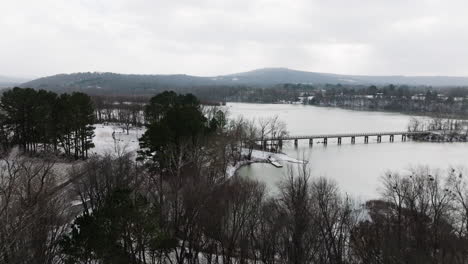 Winter-lake-landscape-in-Arkansas-lake-Sequoyah,-overcast-day,-forward,-aerial