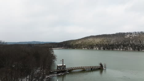 Old-bridge-in-Lake-Sequoyah-Arkansas,-aerial-drone-view,-winter-day