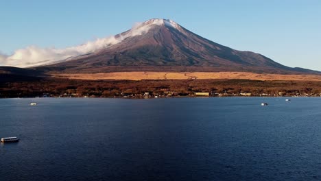 Golden-hour-view-of-Mount-Fuji-with-a-clear-sky-from-Lake-Kawaguchi,-serene-nature-scene