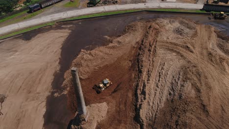 Drone-shot-of-machinery-moving-bagasse-tailings-at-a-paper-and-tissue-wading-mill-in-South-Africa