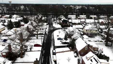 An-aerial-view-of-a-suburban-neighborhood-after-it-snowed