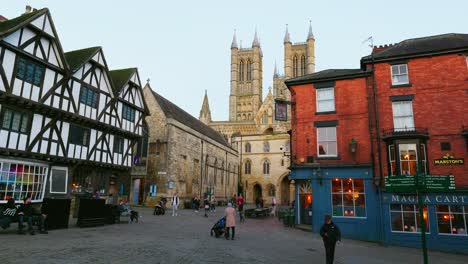 Views-of-the-famous-landmark-Lincoln-Cathedral-showing-sightseers-and-shoppers-walking-along-the-busy-streets-in-the-historic-town-of-Lincoln