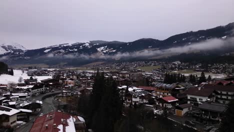 Kirchberg-township-in-winter-season,-aerial-drone-time-lapse-view