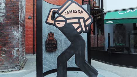 Barrelman-figure-outside-from-Jameson-Irish-Whiskey-Distillery,-Dublin