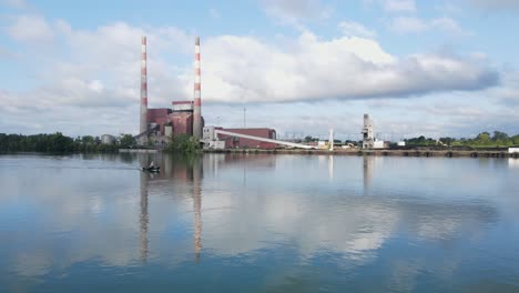 Reflection-of-Trenton-Channel-Power-Plant-in-Detroit-River,-Trenton,-Michigan,-USA