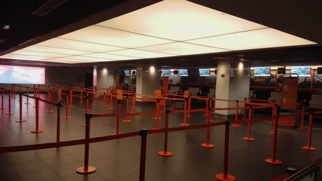 Empty-EasyJet-Airport-Check-In-Departure-Terminal-During-Coronavirus-Pandemic-Outbreak,-Euroairport,-Basel-Mulhouse-Freiburg,-Switzerland