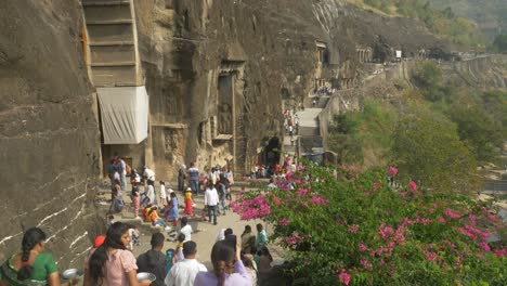 Tourists-at-rock-cut-Buddhist-cave-monuments-Ajanta-Caves