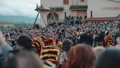 Sea-of-Spectators-at-Caretos-Parade,-Podence-Carnival