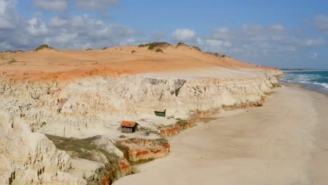 Aerial-view-of-the-cliffs-and-the-beach-of-Morro-Branco,-Ceara,-Fortaleza