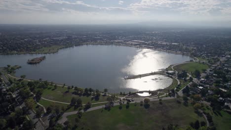 A-4K-high-flying-drone-shot-of-Sloan’s-Lake,-the-biggest-lake-in-the-city-of-Denver,-Colorado,-and-home-to-the-second-largest-park-in-the-city,-and-a-myriad-of-outdoor-activities