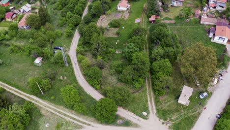 Orbiting-drone-shot-overlooking-the-neighborhood-of-Tsarichina-Hole,-also-called-Area-51-and-known-for-some-paranormal-activities-in-Bulgaria