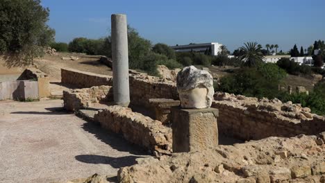 Ancient-Roman-ruins-in-Carthage,-Tunisia-with-clear-blue-skies