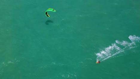 Aerial-view-of-person-practing-kite-surf,-Cumbuco,-Ceara,-Brazil