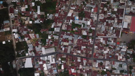 Aerial:-Panoramic-top-down-of-San-Juan-La-Laguna-village-in-Guatemala-during-an-overcast-day