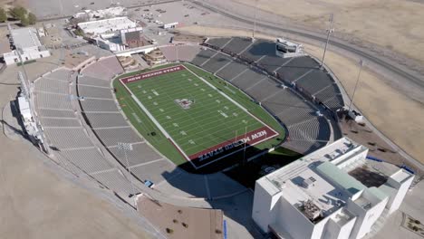 Aggie-Memorial-stadium-on-the-campus-of-New-Mexico-State-University-in-Las-Cruces,-New-Mexico-with-drone-video-moving-in-a-circle