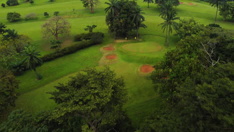 Aerial-view-over-the-Le-Golf-Club-de-Yaoundé,-cloudy-day-in-Cameroon,-Africa