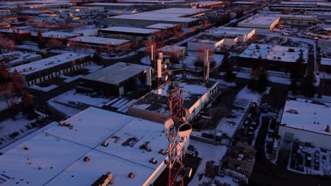 Aerial-shot-of-the-cellular-tower-in-the-warehouse-district-in-Calgary