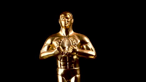 Close-Up-of-Oscar-Statue,-Golden-Hollywood-Academy-Movie-Award-Trophy-Replica