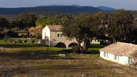 Scenic-countryside-landscape-with-traditional-french-farm-houses-in-southern-France