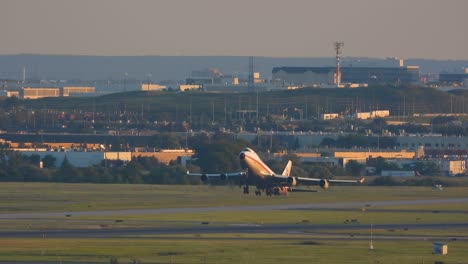 Boeing-Aircraft-Taking-Off-From-Runway-Of-Toronto-Pearson-Airport-At-Sunset