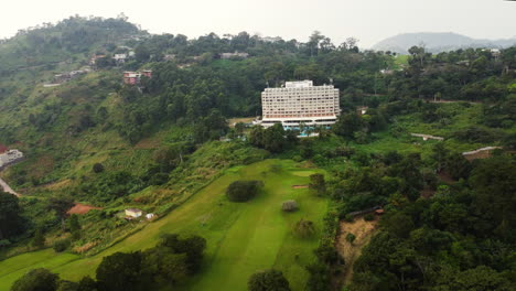 Drone-shot-away-from-the-Hotel-Mont-Febe,-cloudy-day-in-Yaounde,-Cameroon