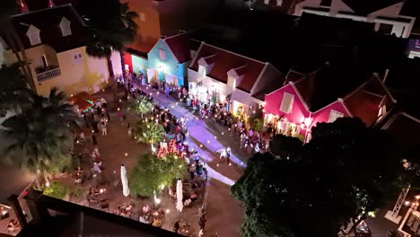 High-fashion-event-takes-place-in-Kura-Hulanda-village-in-Otrobanda-Willemstad-Curacao-at-night-with-camera-flashes