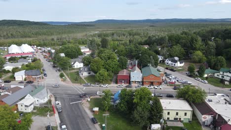 Aerial-sideway-shot-of-the-Polka-fest-in-Cedar-Michigan,-USA-on-a-nice-day