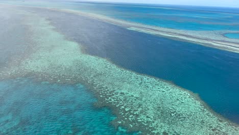 Aerial-4K-of-Great-Barrier-Reef-in-Queensland,-Australia-in-December-2022