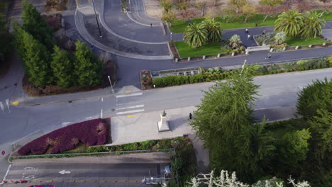 Aerial-View-of-San-Francisco-Golden-Gate-Park-Bandshell-and-Street-Behind-Trees,-Drone-Shot