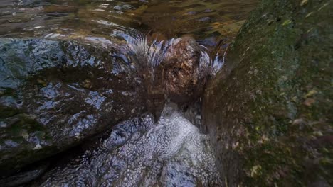 slow-motion-waterfall-in-from-rock-pool-and-bubbling