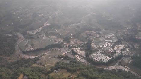 Mist-covers-landscape-of-terraced-rice-layers
