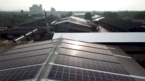 4k-Aerial-of-Warehouse-Solar-Rooftop,-Drone