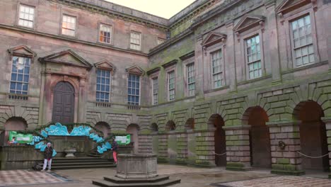 Profile-view-of-vacant-Lyme-house-courtyard-in-Cheshire,-England-during-daytime