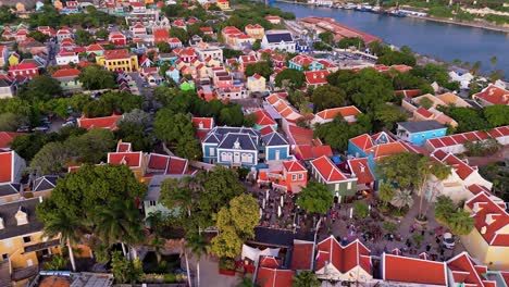 Drone-push-in-tilt-down-to-reveal-Kura-Hulanda-village-in-Otrobanda-Willemstad-Curacao-at-midday