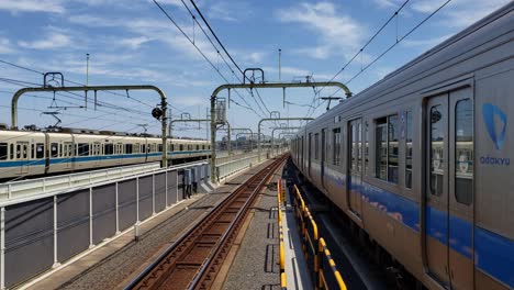 Footage-of-the-approaching-and-leaving-train-at-Noborito-Station-in-Kanagawa,-Japan