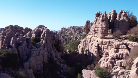 Aerial-forward-dolly-of-nature-reserve-at-El-Torcal-de-Antequera,-Malaga,-Andalusia,-Spain